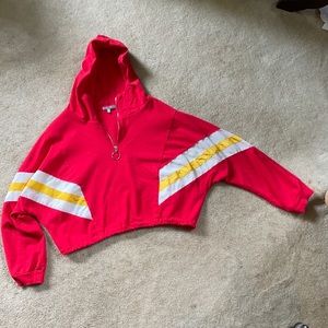 Slight crop top hoodie, is not thick sweatshirt material.